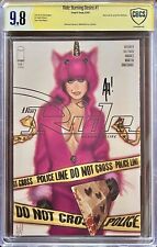 THE RIDE BURNING DESIRE #1 - CBCS 9.8 - SIGNED by Adam Hughes - Iconic Cover