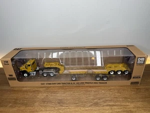 CATERPILLAR CT660 DAY CAB MIT LOWBOY TRAILER 1/50 DIECAST MASTERS 85503C - Bild 1 von 5