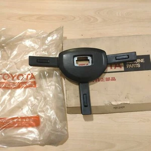 NOS TOYOTA LANDCRUISER FJ40 FJ45 BLACK STEERING WHEEL CENTER HORN PAD GENUINE - Picture 1 of 10