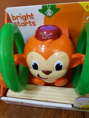 Juguete Mono Bright Starts Roll & Glow con Luces y Melodías, Edades 6 meses + Foto 1 de 4
