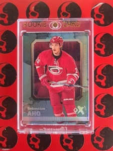 2016-17 Sebastian Aho Fleer Metal /23 EX 2017 Rookie #23 Carolina Hurricanes RC - Picture 1 of 2
