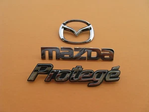 2002 2003 MAZDA PROTEGE REAR CHROME EMBLEM LOGO BADGE SIGN 02 03 USED SET A44521 - Picture 1 of 6