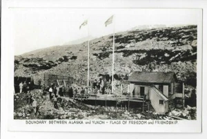 RPPC-FLAGS OF FREEDOM & FRIENDSHIP,BOUNDRY BETWEEN AK,ALASKA & YUKON - Picture 1 of 1