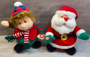 T.L. Spielzeug singender & tanzender Weihnachtsmann & Caroler Plüsch interaktiv - Bild 1 von 7