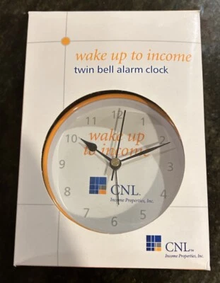 Yellow Metal Twin Bell Alarm Clock Promotional Piece From CNL - Image 1 of 4