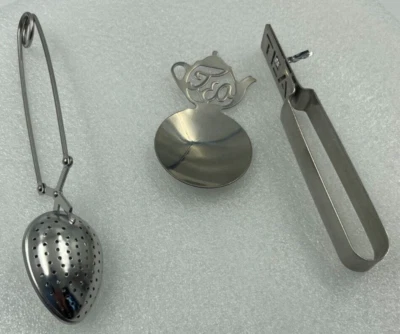 Lot of 3    Tea bag squeezer.  Tea bag -Spoon rest and Loose Tea Infuser spoon - Image 1 of 4