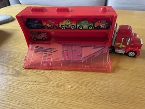 Disney Pixar Mack Transporter Rusteze And 6 Micro Cars Incl Lightening McQueen - Picture 1 of 10