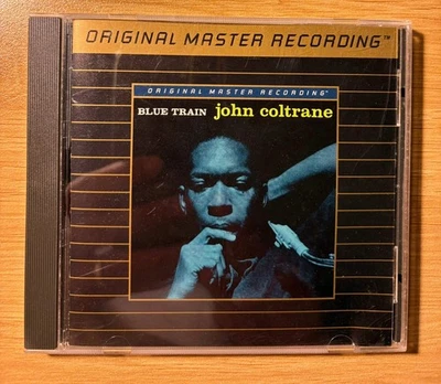 Tren azul John Coltrane oro 24K Foto 1 de 3