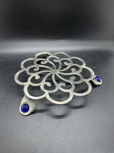 Silver Aluminum Ornate Trivet With Cobalt Stones At Feet - Picture 1 of 4