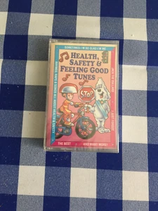 Health, Safety & Feeling Good Tunes Cassette 1992 Purple Balloon Players NEW - Foto 1 di 2