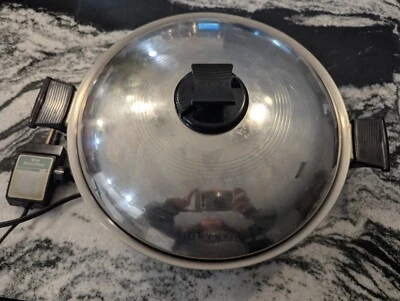 Sartén eléctrica Rena Ware 14" de acero inoxidable West Bend núcleo líquido salteado tapa de sartén Foto 1 de 4