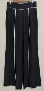 Pantalones de seda Nicole Miller Artelier negros exclusivos boutique 006082 frente abierto 12 - Imagen 1 de 12