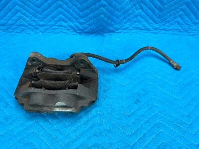 Pinza de freno delantera Toyota Land Cruiser LX470 con pastillas y manguera LH 89K 1998-2002 OEM Foto 1 de 4