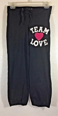 Pantalones informales para niñas junior Nana talla mediana negros Team Love cintura elástica Foto 1 de 4