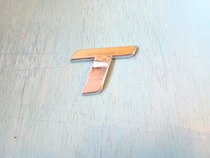Genuine AUDI T T SINGLE LETTER "T" ONLY BOOT BADGE Rear Emblem Logo 2006-2014 - Picture 1 of 2