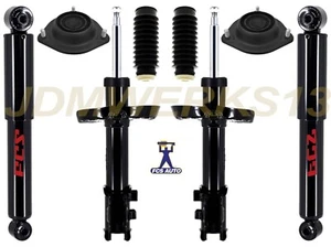 FCS 4 SHOCKS STRUT MOUNTS & BOOTS ENCLAVE TRAVERSE ACADIA OUTLOOK 13 14 15 16 17 - Picture 1 of 1