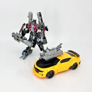 Transformers Optimus Prime und Bumblebee, 2 in 1 gebraucht ohne OVP Anleitung - Bild 1 von 7
