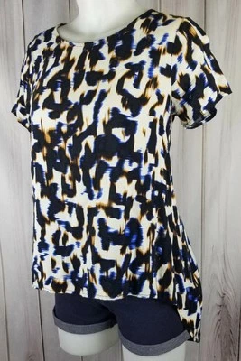 Túnica pequeña lirio blanco rayón asimétrica dobladillo alto arte abstracto top camisa fluida Foto 1 de 4