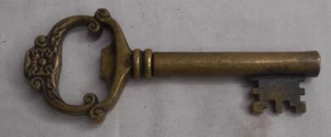 Vintage - Chiave scheletro in metallo con cavatappi nascosto apribottiglie lunga 4-3/4" - Foto 1 di 3