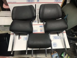06-11 Juego reposacabezas asiento delantero/trasero negro BMW E90 325i 328i 335i sedán - Imagen 1 de 2