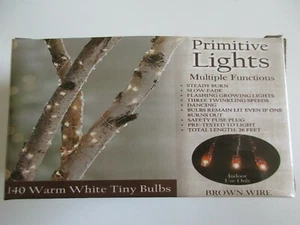 140 Teeny Warm White Bulbs 7 Chase Light Modes Functions with 26' Brown Cord - Picture 1 of 2