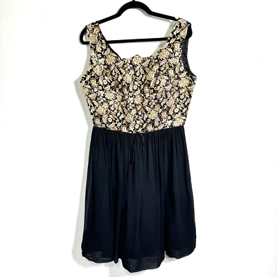 Vestido de cóctel vintage años 60 brocado dorado y chifón negro talla M Foto 1 de 4