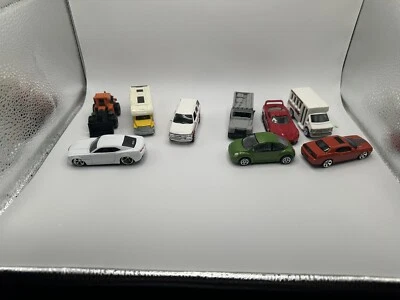 Lot of 9 Assorted Diecast Cars - Matchbox, Jada, Realtoy, and Maisto - Image 1 of 4