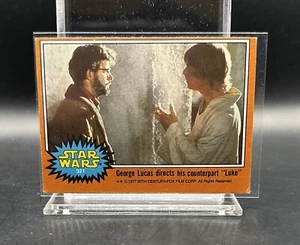1977 Topps Star Wars #321 George Lucas Directs His Counterpart Luke Solo Kenobi - Picture 1 of 2