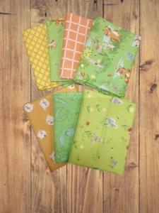 Paquete de 7 cuartos de grasa - Surtido de 100 Aker Woods Pooh Green Fat Quarter - Imagen 1 de 2
