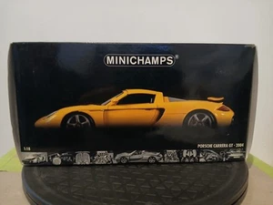 1:18 Minichamps 2004 Porsche Carrera GT with LEATHER SEATS Yellow - Picture 1 of 20