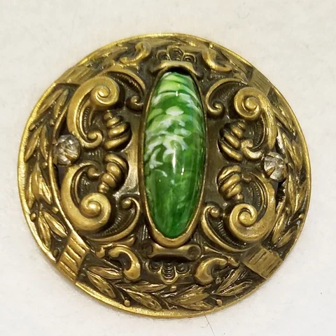 AMAZING PIERCED BRASS GAY 90S BUTTON W/AN ELONGATED MOTTLED GREEN STONE 1-3/4" Cover