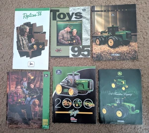 SIX  JOHN DEERE MERCHANDISE, TOYS, PROMOTIONS, CATALOGS, all Different years - Picture 1 of 2