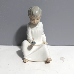 NAO By Lladro Figurine Boy In Night Shirt Holding Candle - Picture 1 of 10