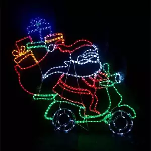 Christmas LED Motif Santa Riding Scooter 122x112cm Animated Wheels Outdoor Decor - Picture 1 of 1