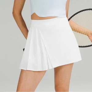 Gonna tennis Lululemon asimmetrica plissettata taglia 6 bianca atletica elasticizzata - Foto 1 di 11