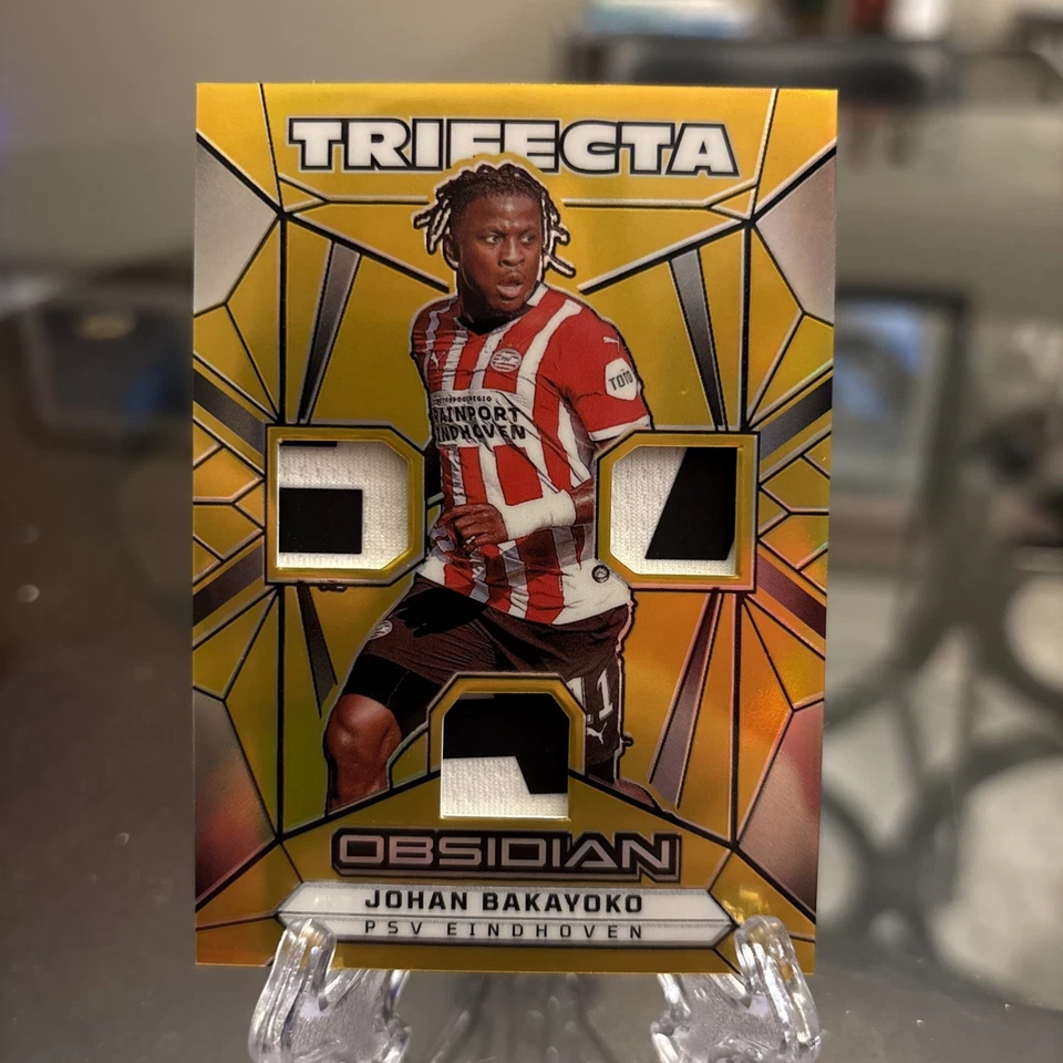 2024-25 Panini Obsidian Johan Bakayoko Triple Patch Gold #1/5 PSV - Imagem 1 de 4