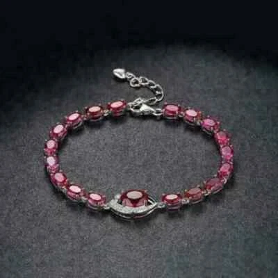 Pulsera de tenis para mujer 6,00 quilates corte ovalado simulado rojo rubí chapado en oro blanco de 14 quilates Foto 1 de 4