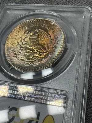 1985 Mexico Libertad 1 Onza PCGS MS-64 Rainbow Toning on Reverse - Image 1 of 4