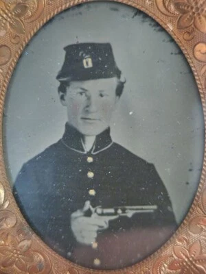 Civil War tintype of Unidentified soldier in  frock coat with revolver in case - Image 1 of 4