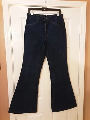 Pantalones de mezclilla vintage años 70 Levi's Bell Bottom ~ pestaña naranja, pequeños e ~ con fecha de julio de 1975 Foto 1 de 4