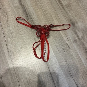  String Tanga mit Perlen und Spitze - Bild 1 von 2