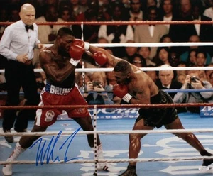 Mike Tyson Autographed 16x20 Landing Punch Photo- JSA W Auth *Left - Picture 1 of 2