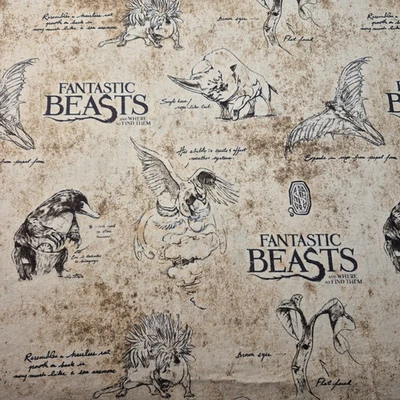 Tan Harry Potter Wizarding World Fantastic Beasts Logo & Creatures 1 yd - Image 1 of 4