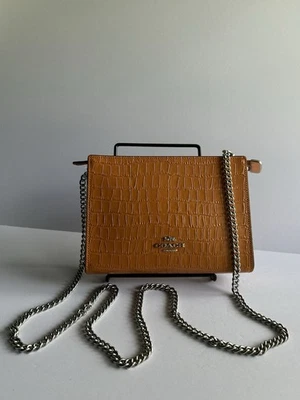 Bolso sin asas bandolera de cuero naranja Coach herrajes dorados nuevo con etiquetas Foto 1 de 4