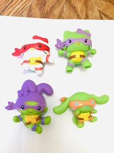 McDonald’s 2025 Hello Kitty TMNT Figuren Konvolut (4) lose lesen - Bild 1 von 7