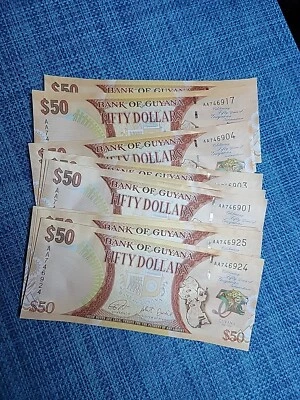 🇬🇾 Billetes Guyana 50 dólares P-41 AU (CADA UNO) 2016 012925-6 Foto 1 de 2