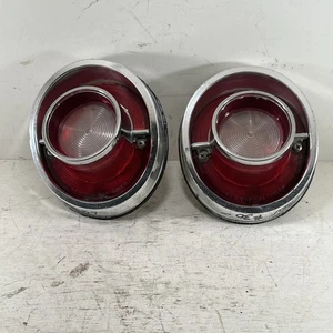 Juego de lentes y bisel de luces traseras guía GM 5955336 para Chevrolet 1964 OEM 5955336 - Imagen 1 de 15