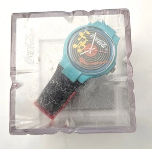 OROLOGIO SWATCH-Coca Cola Lady 1987 FL100 Rock Around The Clock - Neu - Bild 1 von 3