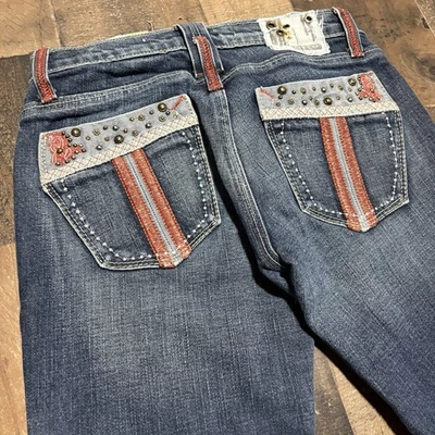Jeans de mezclilla de tiro ultra bajo vintage con tachuelas ojal diésel corte boot talla 1 Y2K Foto 1 de 4