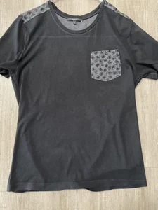 T-shirt Gucci nera con tasca stampa leopardo m3_0712 - Foto 1 di 6
